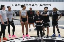 Kierstan Bell grabs head coach Becky Hammon’s shoulders a the end of the Las Vegas Aces ...